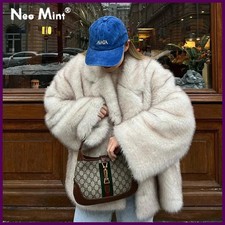 “Women’s Faux Fox Fur Coat