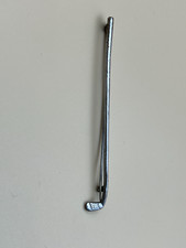 Vintage golfing brooch, 8.5 cm long.