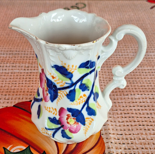 White ceramic floral creamer - white,