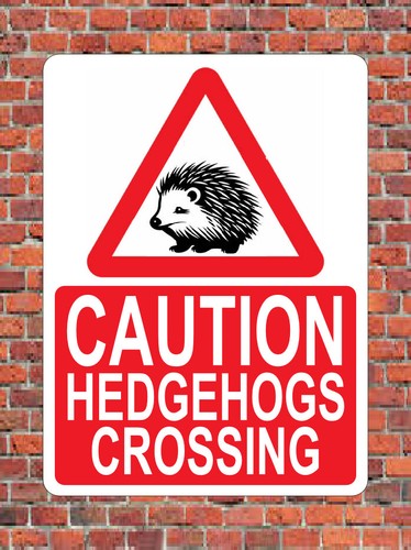 Caution hedgehogs crossing - caution,