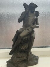 A Heredities bronzed figure of