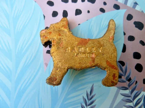 Radley gold colour brooch - radley,