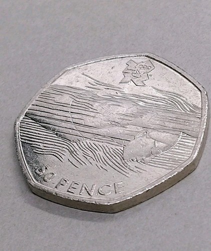 2011 50p aquatics olympic coin - 50p,