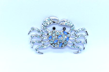 Silver-tone crab brooch with