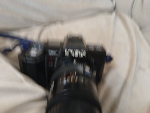 The image shows - a, minolta