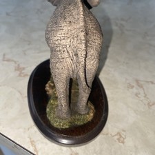 Country Artists Grey Elephant On A Plinth