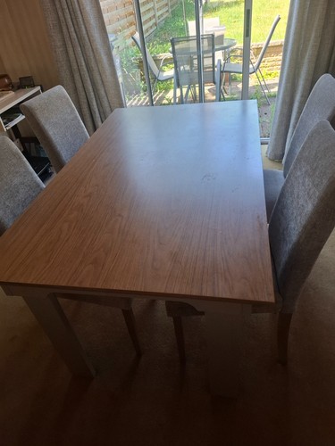 Table and chairs used - and,