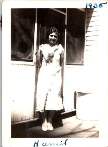 Girl standing front - in, of