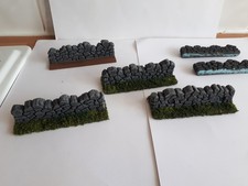 Hand made war game terrain dry stone walls.