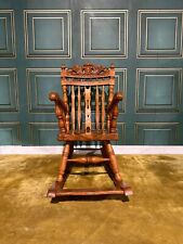 Decoratively Carved Childs Rocking Chair