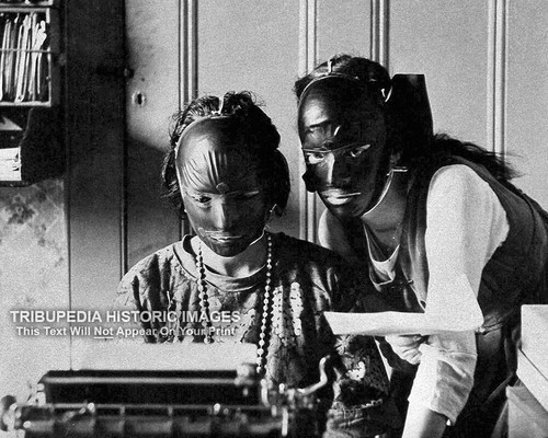 Girls wearing rubber masks - girls,