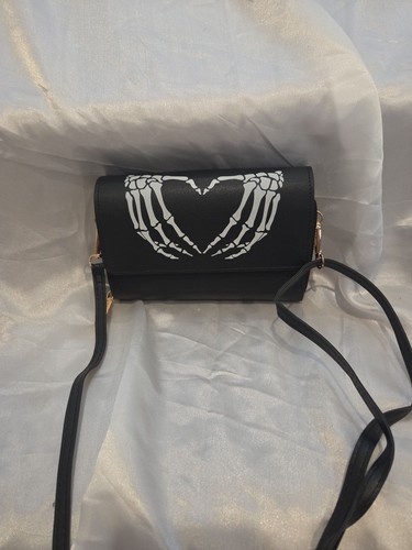 Skeleton hand heart crossbody - heart,