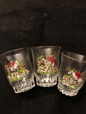 3 vintage shot glasses with