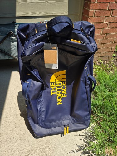 North face rolling duffel - face,