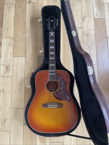 Epiphone gibson hummingbird - gibson,