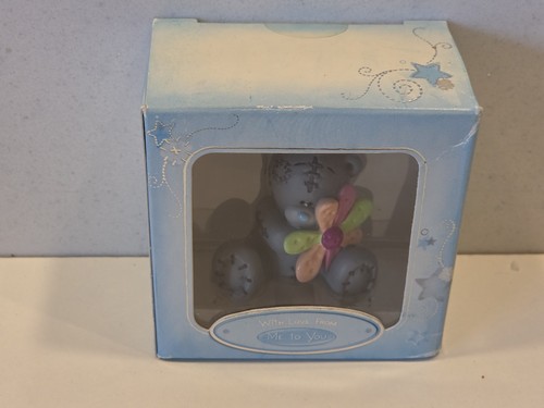 You bear figurine - to,