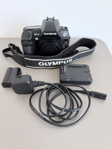 Olympus dslr camera body - dslr,