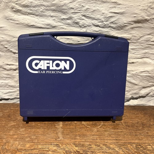 Caflon ear piercing - ear,