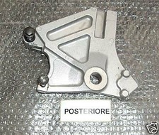 REAR BRAKE CALIPER SUPPORT