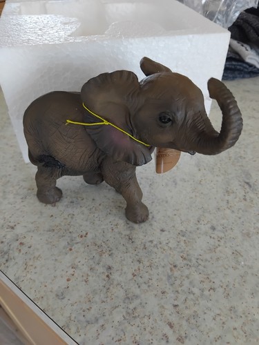 Elephant ornament brown out - , of
