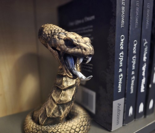 Stunning snake book end left - book,
