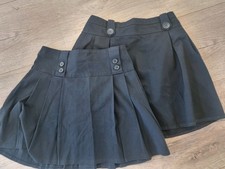 M&S black school skirts age 9-10 years