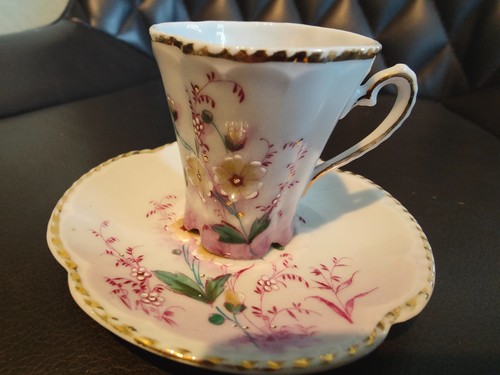Miniature cup and saucer