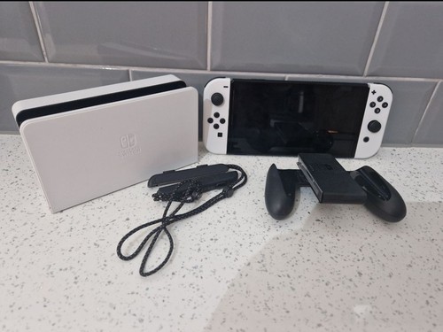 Nintendo switch oled 64gb - nintendo,
