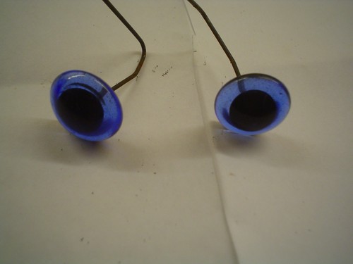 One pair blue glass teddy - one,