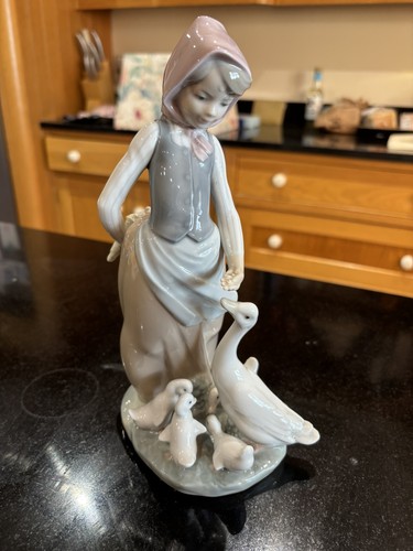 Lladro girl feeding - feeding, geese