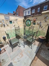 Glass Top Table Good Condition.  Elegant Outside Dinning Set.