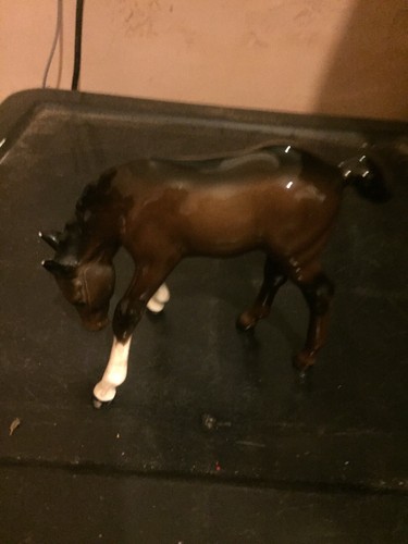 Beswick foal with head down - with,