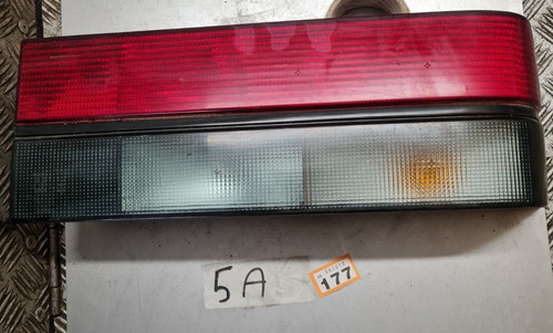 Mazda 323 sedan - driver, side