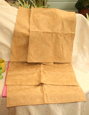 FOUR LAURA ASHLEY FABRIC PLACE MATS, DAMASK, ANTIQUE GOLD COLOUR, UNUSED