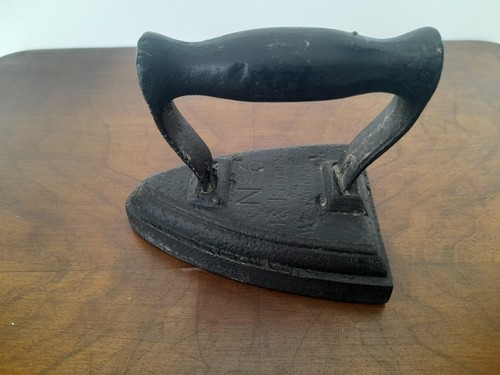 Flat iron j - iron, by