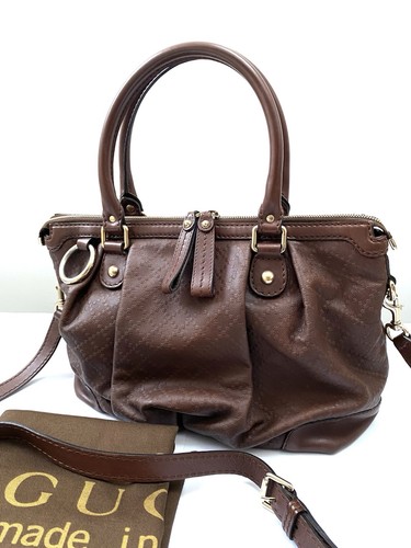 Gucci brown leather - brown,