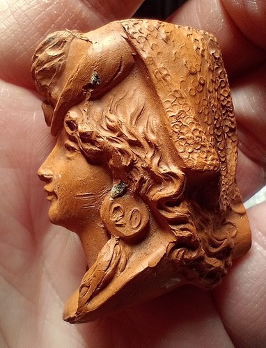 Clay pipe woman with - with, hat
