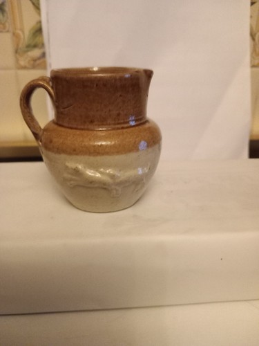Small jug with dogs it - small, on