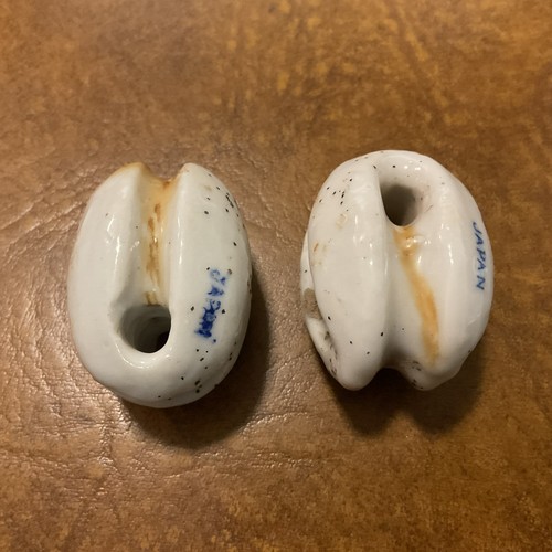 Pair small white ceramic - of,