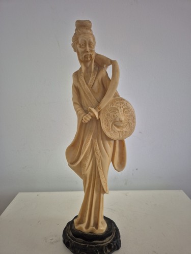 Santini sculpture asian man - a,