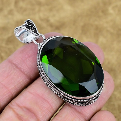 Faceted peridot gemstone - faceted,