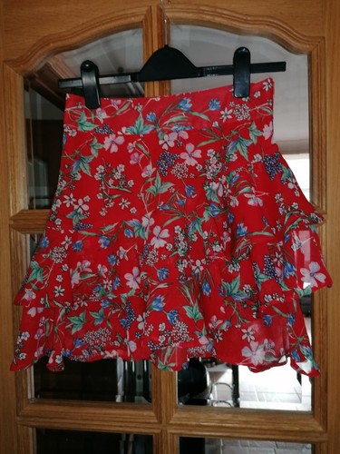 Two ladies short skirts - two, size