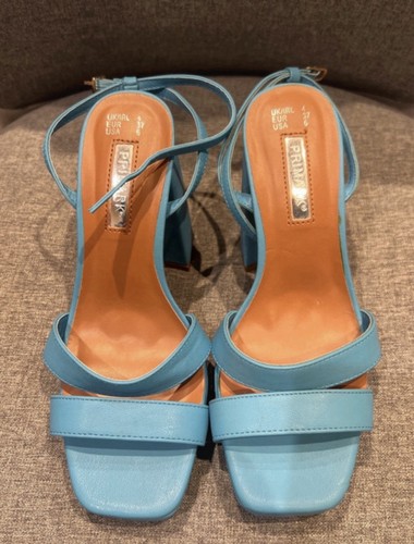 Never been worn blue heeled - never,