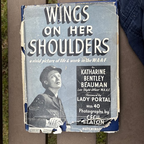Wings her shoulders by - wings,