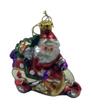 Santa Claus On A Scooter Glass