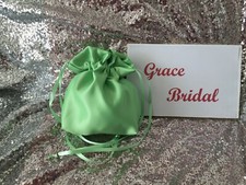 APPLE GREEN SATIN DOLLY BAG