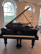 Black grand piano for sale