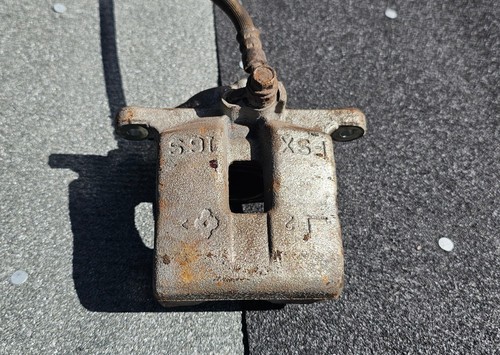 Mazda brake caliper front - mazda,