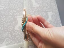 118E antique 9ct pale rose gold hinged bangle with turquoise beads and safety ch