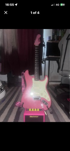 Pink electric guitar - electric,
